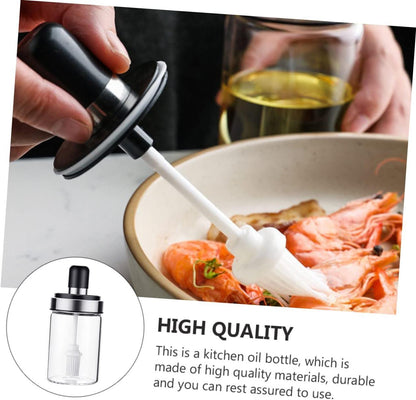 Oil dispenser brush bottle applying sauce to seafood dish