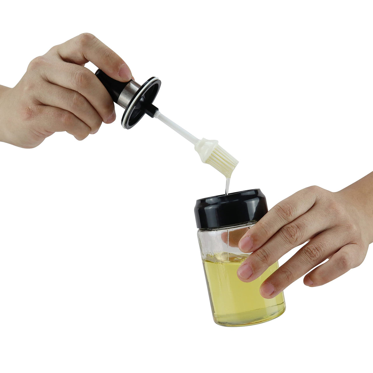 Removing brush from oil dispenser bottle showing pump mechanism